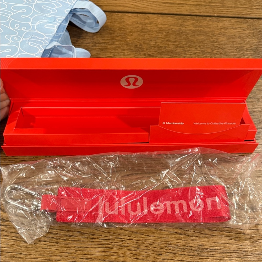 Lululemon Red never lost Keychain and Box Set with bag